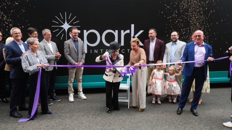 Lee Goldberg cuts the ribbon opening Spark Interactive